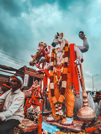 Low angle view of statue against sky