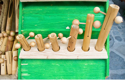 Close-up of figurine on wood