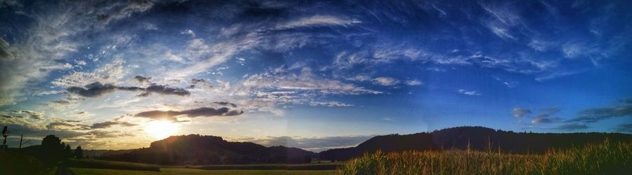 Panoramic view of landscape against sky during sunset