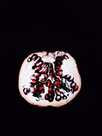 Close-up of strawberry against black background