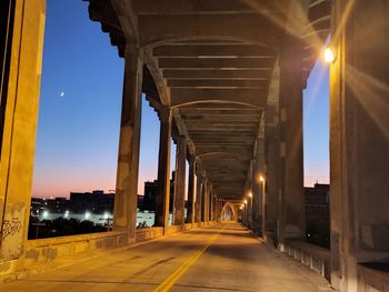 Under a bridge at dusk