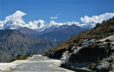Scenic view of snowcapped mountains against sky