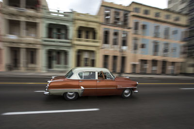 Cars on road in city