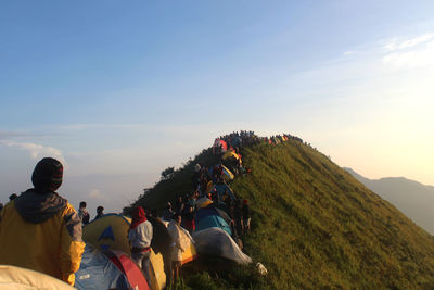 People at town square against sky