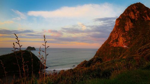 Scenic view of sea against sky during sunset