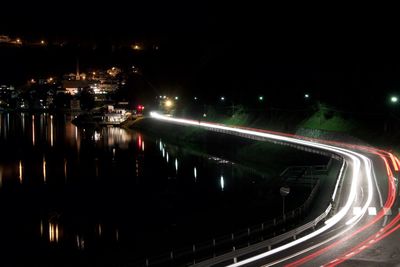 Light trails on city street at night