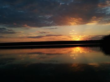 Scenic view of sunset over lake