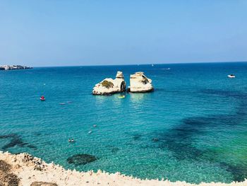 Scenic view of sea against clear sky