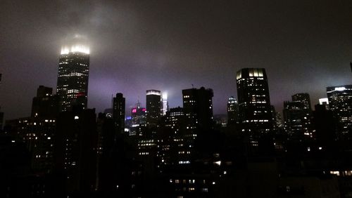 Illuminated cityscape at night