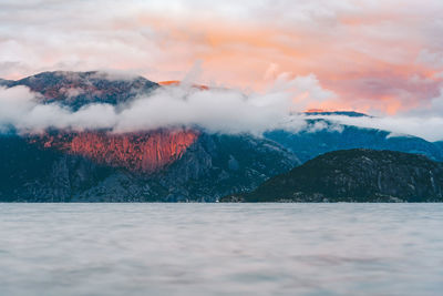 Scenic view of mountains against sky during sunset