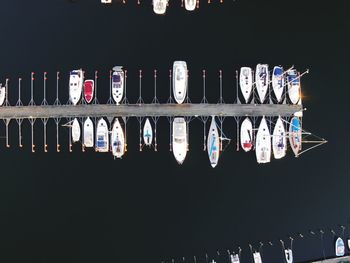 Close-up of clothes hanging against black background