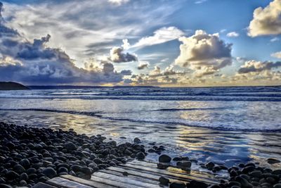 Scenic view of sea against sky during sunset