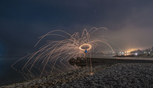 Firework display at night