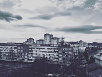 Buildings in city against sky