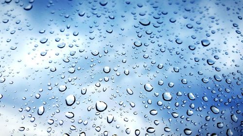 Close-up of water drops on glass