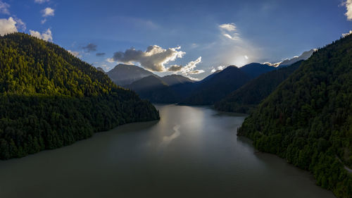 Panoramic view of lake ritsa against the backdrop of mountains in abkhazia.