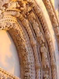 Low angle view of ornate sculpture on building