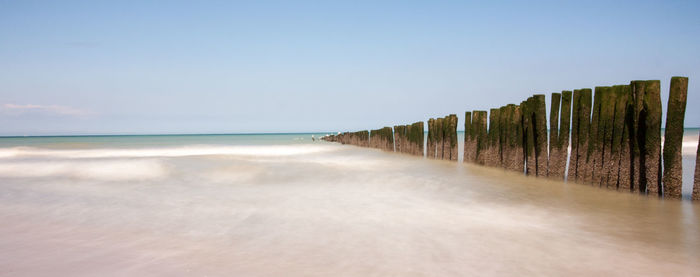 Scenic view of sea against clear sky