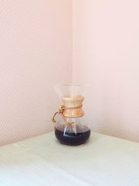 Close-up of coffee cup on table