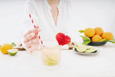 Midsection of woman holding ice cream