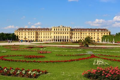 View of formal garden with buildings in background