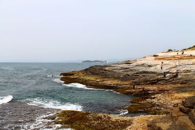 Scenic view of sea against clear sky