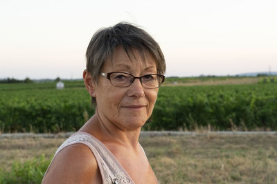 Portrait of mid adult man on field