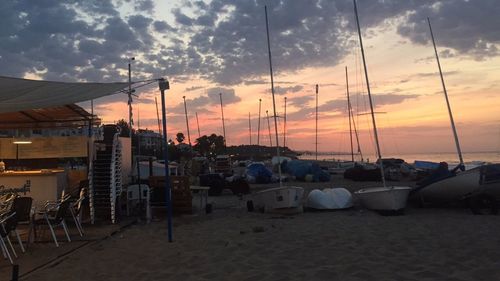 Silhouette of building against sky at sunset