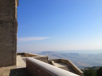 Church stairs on the top of the hill against clear blue sky