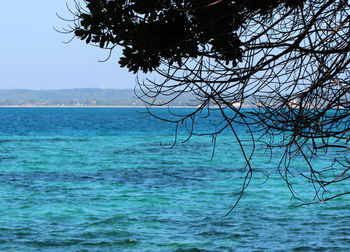 Scenic view of sea against blue sky