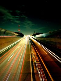 Light trails on road at night