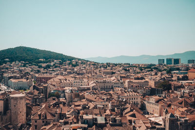 Cityscape against clear sky