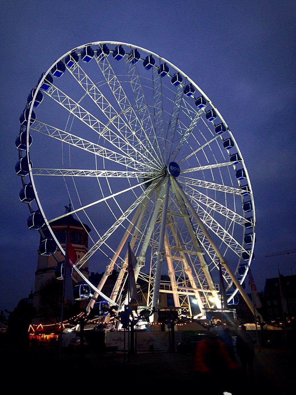 ferris wheel, amusement park ride, amusement park, arts culture and entertainment, sky, low angle view, leisure activity, fun, enjoyment, clear sky, large, big wheel, silhouette, incidental people, traveling carnival, circle, dusk, outdoors, travel destinations, fairground