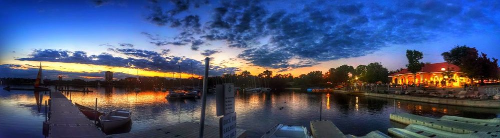 Scenic view of lake against sky at sunset