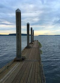 Pier over sea against sky
