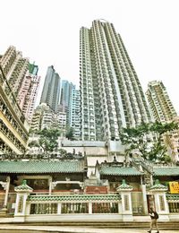 Low angle view of skyscrapers against clear sky