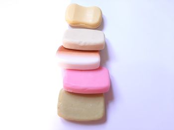 Close-up of candies against white background