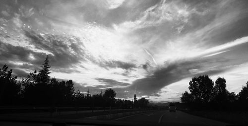 View of road against cloudy sky