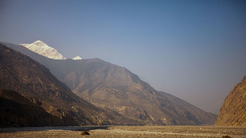 Scenic view of mountains against clear sky