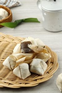 Close-up of food in wicker basket on table