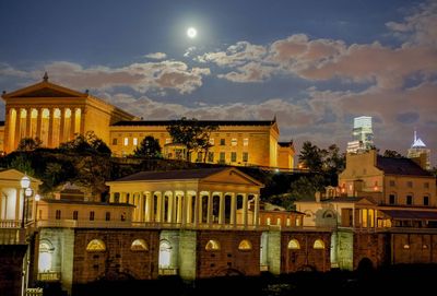 Illuminated philadelphia museum of art against sky at night