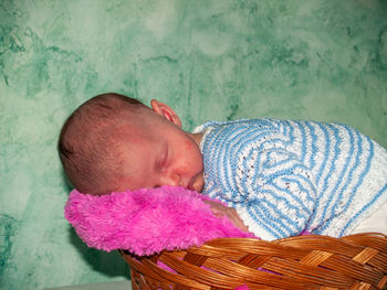 Cute baby sleeping in bed