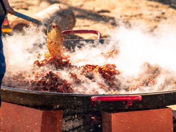 Close-up of meat on barbecue grill