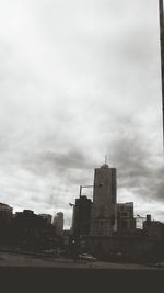 View of buildings against cloudy sky