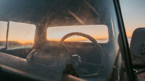 Man seen through car window