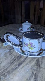 High angle view of coffee cup on table