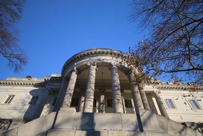 Low angle view of building against blue sky