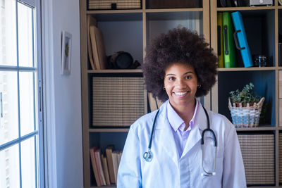 Portrait of smiling doctor in clinic