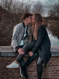 Young couple kissing outdoors