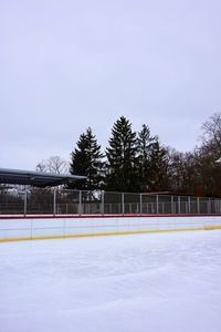 Scenic view of ice skating rink against sky during winter